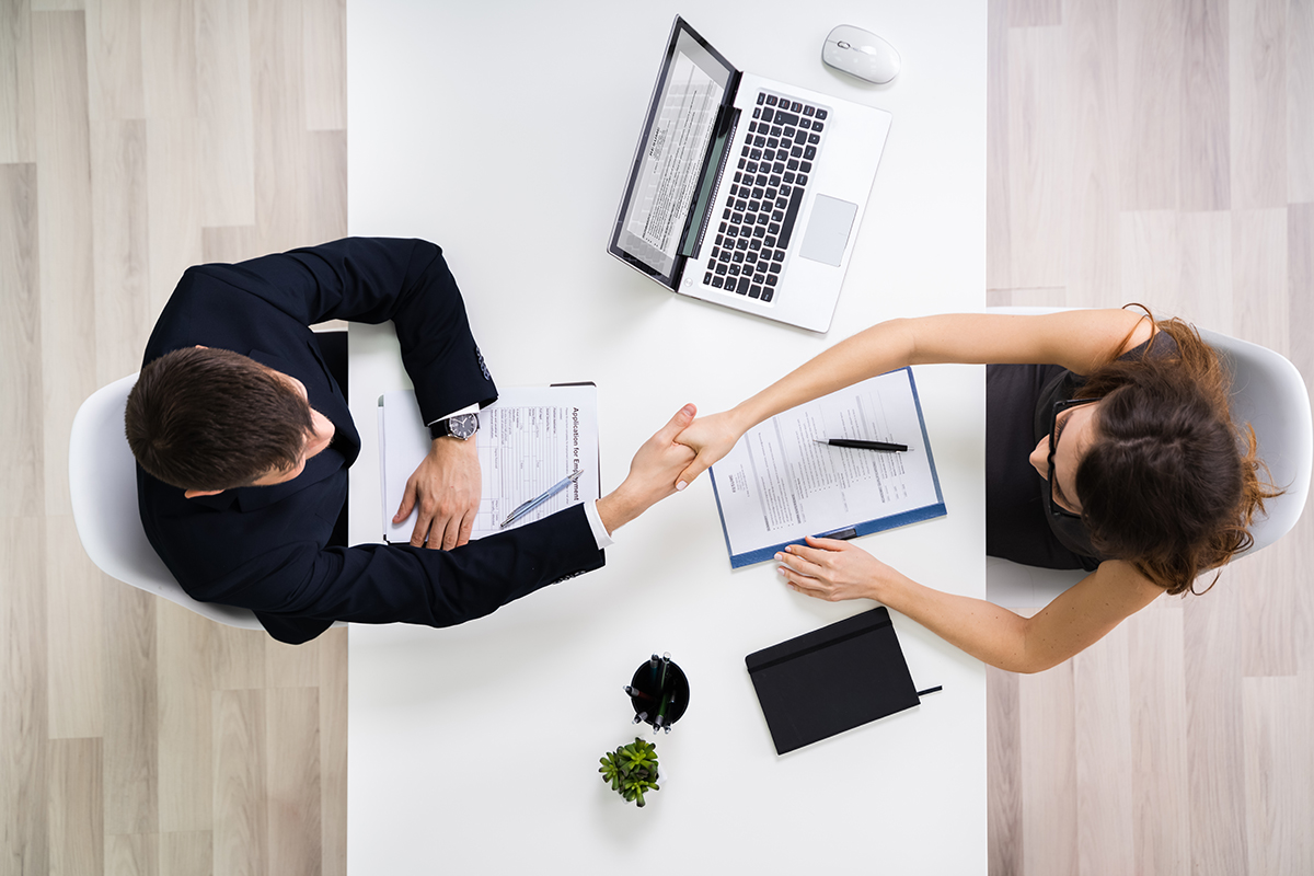 two businesspeople shaking hand
